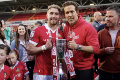 Wrexham secure promotion with 3-0 win