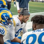 adams receives stafford sideline message