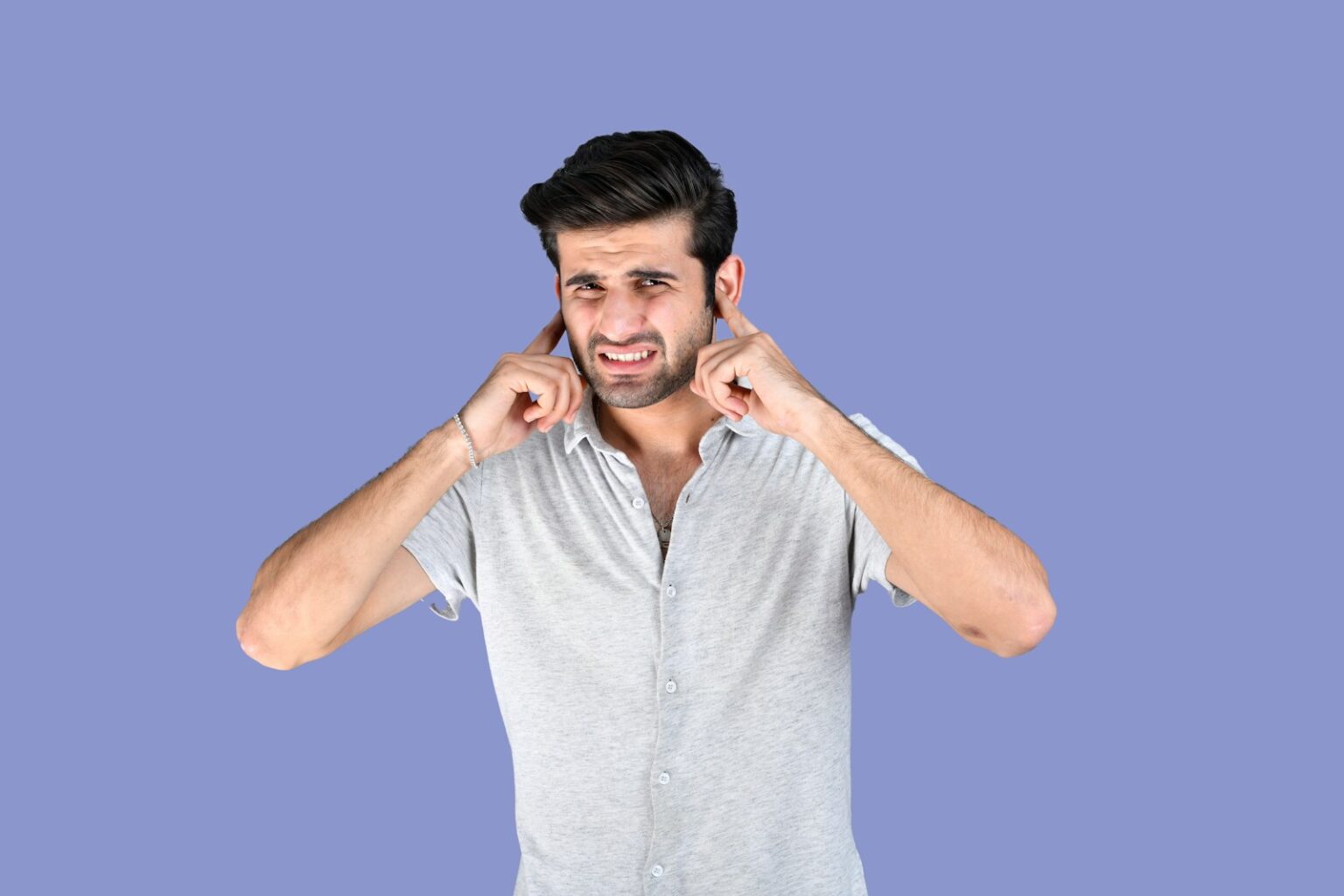 a person with the hands on the head; AAC devices