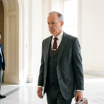 former fed adviser china ties investigated