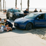 tesla injures woman police pursuit