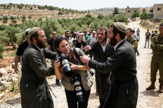 photographer attacked by settlers